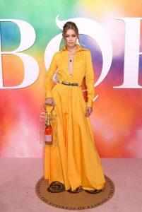 Gigi Hadid’s rosè filled purse on fashion week.